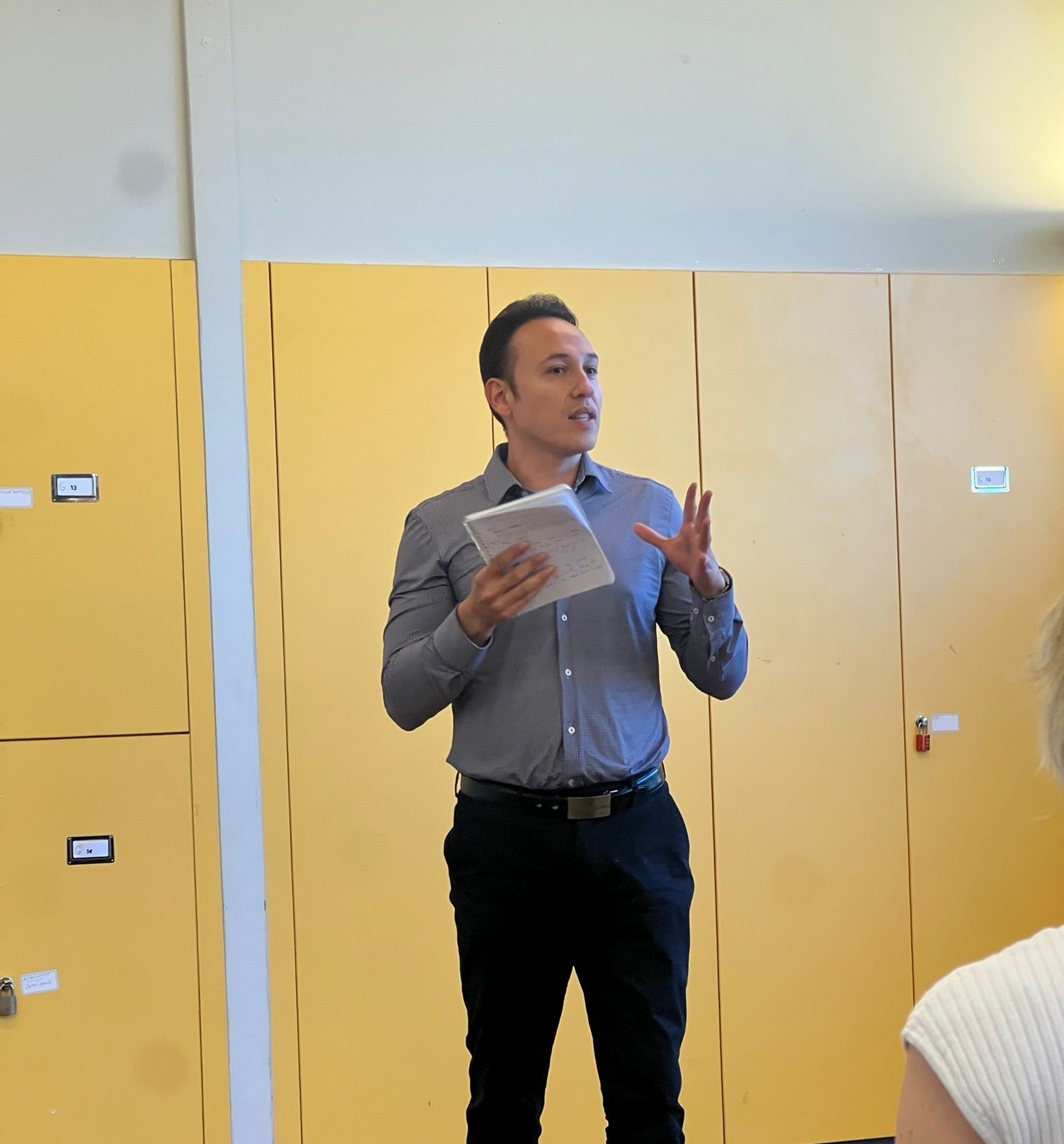 Impact Toastmasters members welcoming guests at a meeting